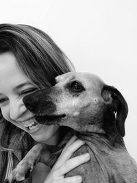 Close-up of woman with dog