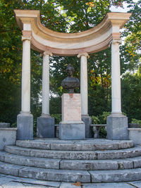 Statue against temple