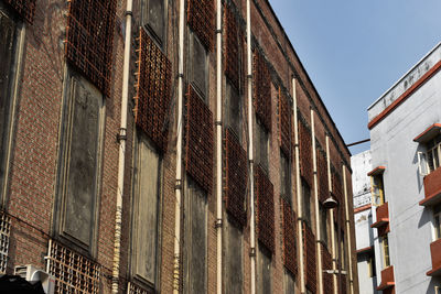 Low angle view of residential building against sky