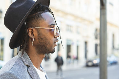 Close-up of young man wearing sunglasses