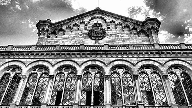 architecture, low angle view, building exterior, built structure, religion, place of worship, sky, facade, window, spirituality, arch, church, ornate, cloud - sky, outdoors, day, no people, history