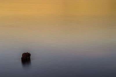 High angle view of lake against sky during sunset