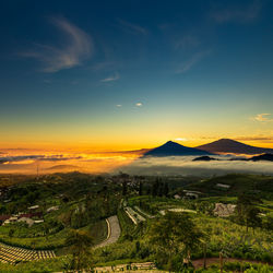 High angle view of landscape against sky during sunset