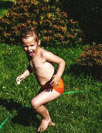 Man relaxing on grassy field