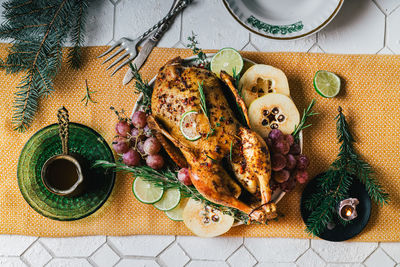 Duck poached for thanksgiving with grapes, quince, rosemary and thyme