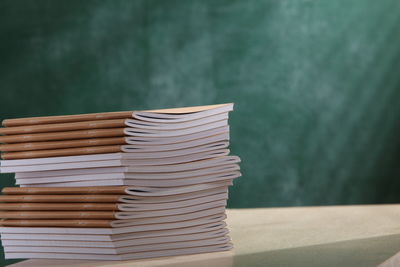 Close-up of book stack on table 
