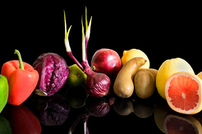 Close-up of candies against black background