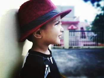 Close-up of young woman in hat