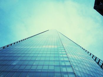Low angle view of built structure against blue sky