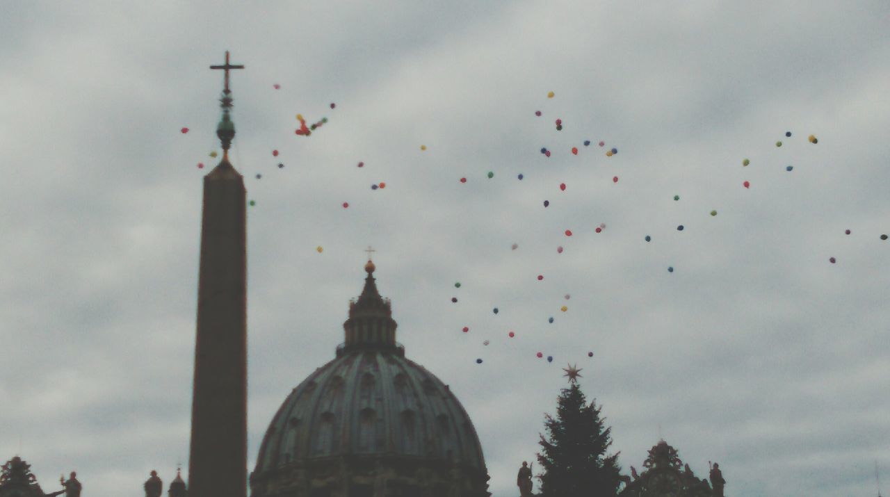 architecture, built structure, low angle view, flying, building exterior, sky, religion, place of worship, spirituality, cloud - sky, dome, bird, famous place, cloudy, church, travel destinations, travel, international landmark, tourism