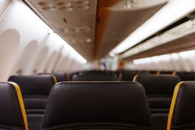 Empty vehicle seats in airplane