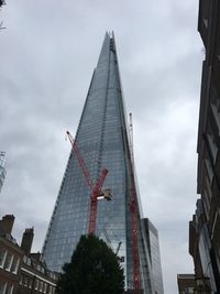 Low angle view of skyscrapers against sky