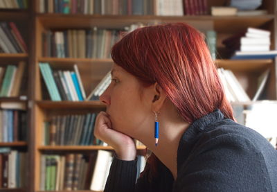 Side view of woman at library