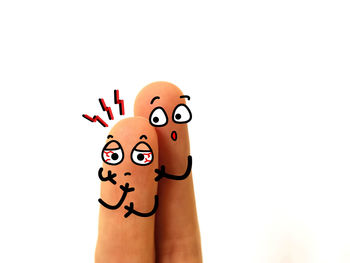 Close-up of human hand against white background