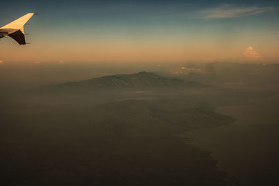 Scenic view of mountains against sky during sunset