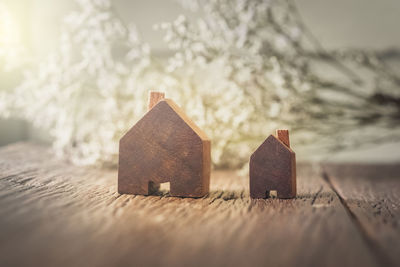 Close-up of toy on table against building