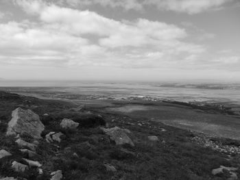 High angle view of sea against cloudy sky