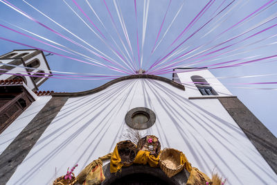 Low angle view of sculpture against sky