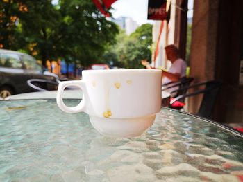 Close-up of coffee cup on table in cafe