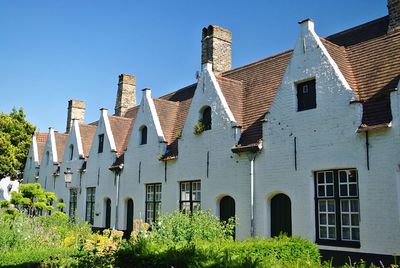 Low angle view of building against blue sky