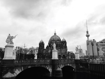 Bridge by berlin cathedral against sky