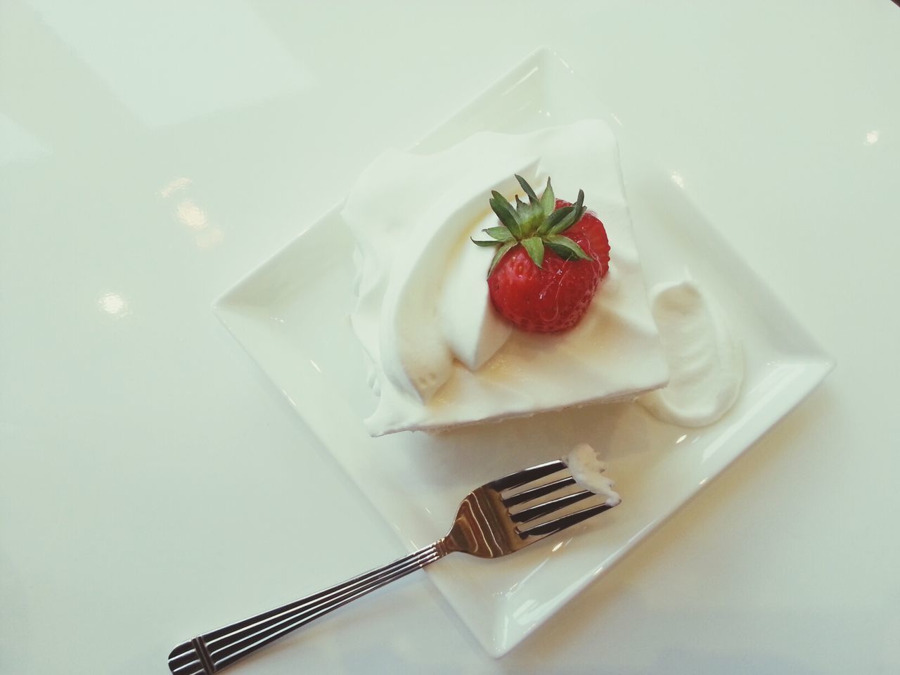 food and drink, food, indoors, freshness, still life, table, ready-to-eat, strawberry, plate, healthy eating, sweet food, fruit, indulgence, fork, white background, high angle view, close-up, dessert, red, temptation