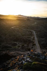 Scenic view of landscape against sky during sunset