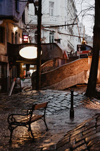 Chairs and tables in illuminated building at night