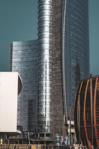 Low angle view of modern building against clear sky