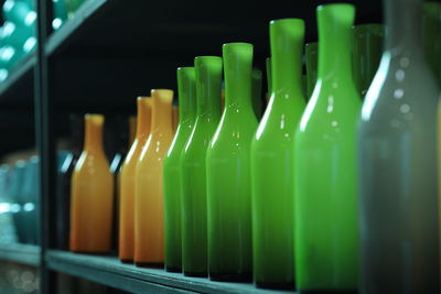 Close-up of empty glass bottles