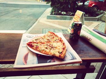 Close-up of pizza served on table