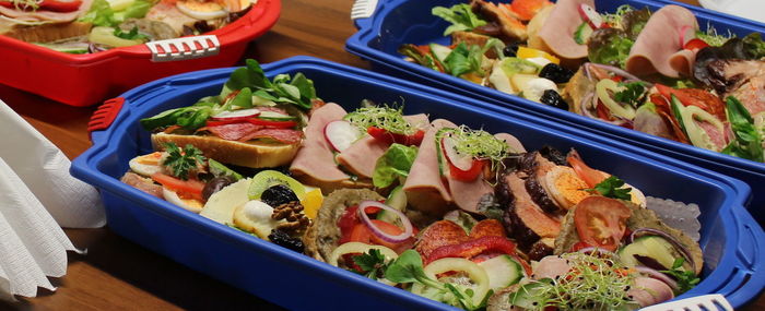 High angle view of food in trays on table