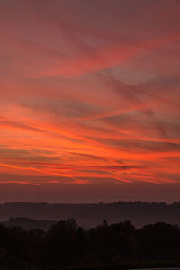 Scenic view of dramatic sky during sunset