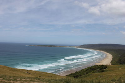 Scenic view of beach against sky