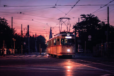 Cable car on tracks at sunset