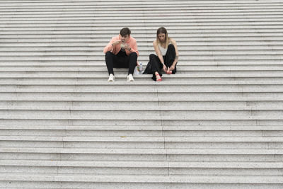 People sitting on staircase