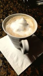 Close-up of coffee cup on table