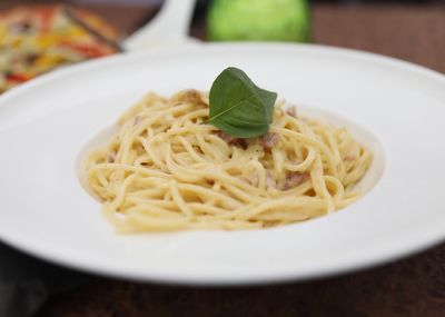 Close-up of pasta served in plate