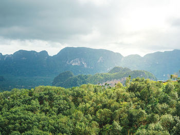 Beautiful landscape of mountain with cloudy sky and greenery in rainy season