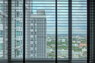 Cityscape seen through window