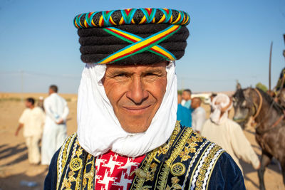 Portrait of man wearing hat