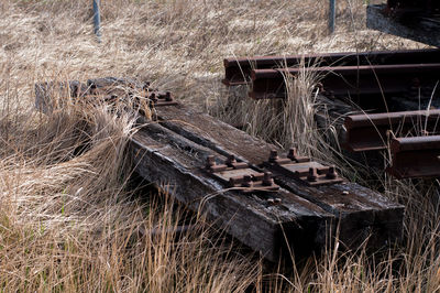 Abandoned shopping cart on field