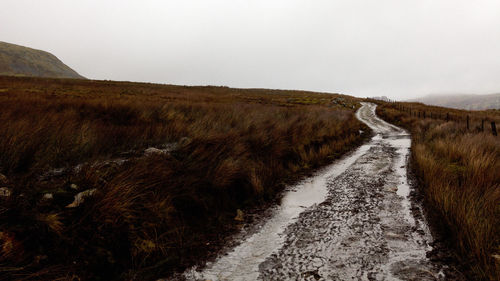 View of road passing through landscape