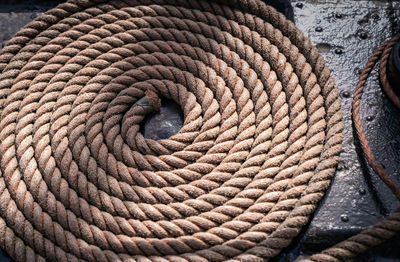 High angle view of rope on metal