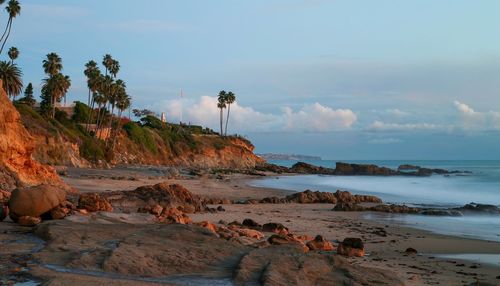 Scenic view of beach against sky