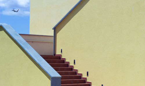 Low angle view of stairs against sky