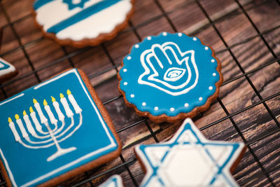 Delicious festive hanukkah cookies for celebrating on a wooden background at home. close-up.