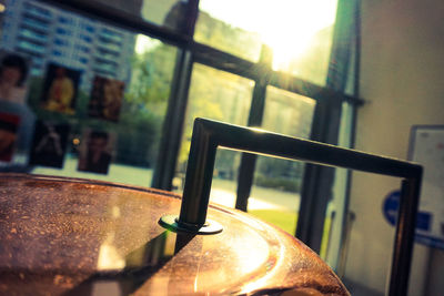 Close-up of empty glass window on table