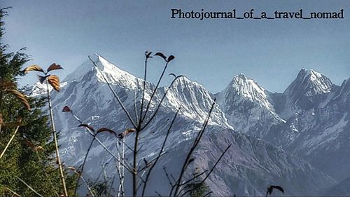 Snow covered mountains against sky