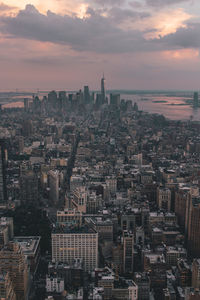 Aerial view of cityscape during sunset